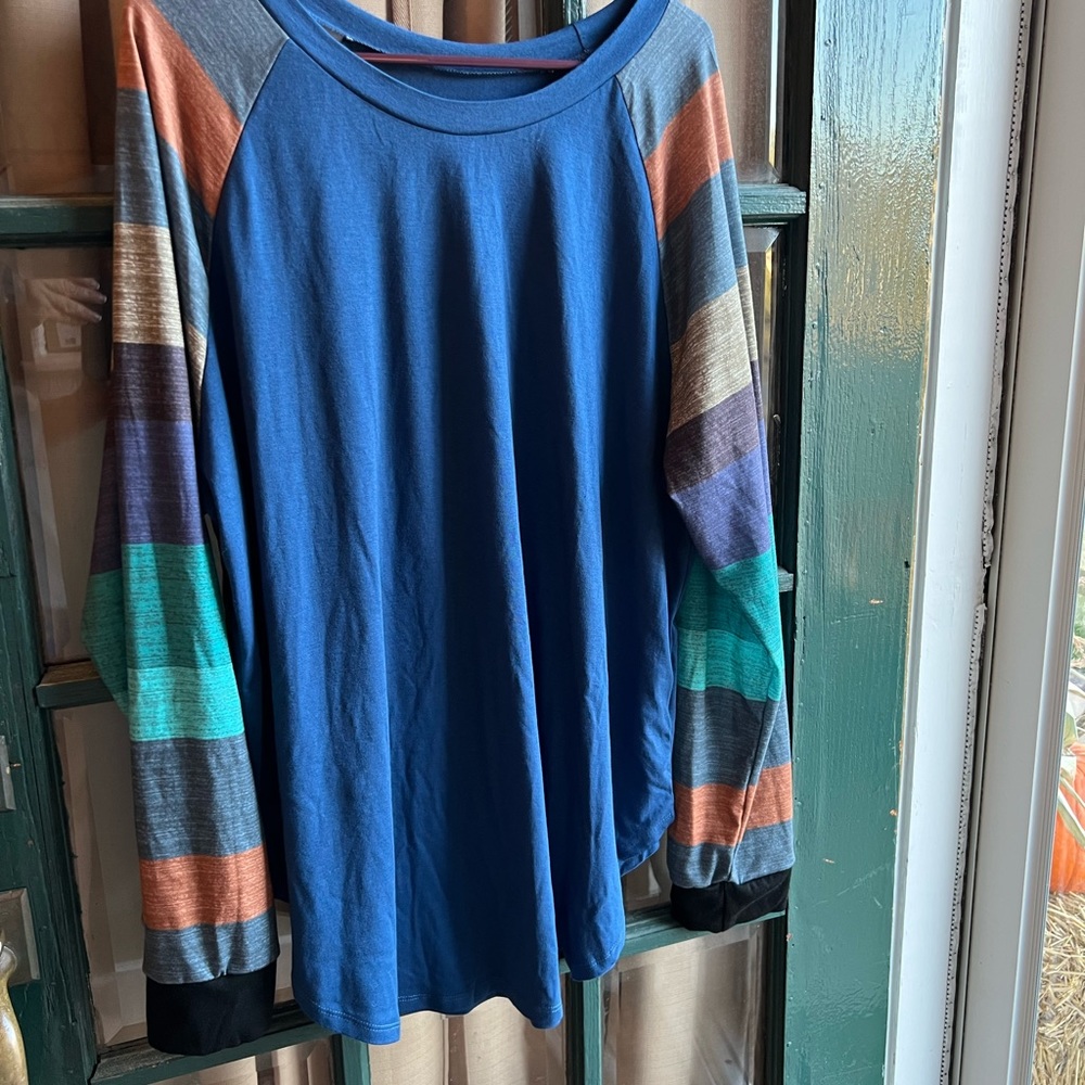 New, without tags.  Too big, never washed or worn. Purchased on Amazon.